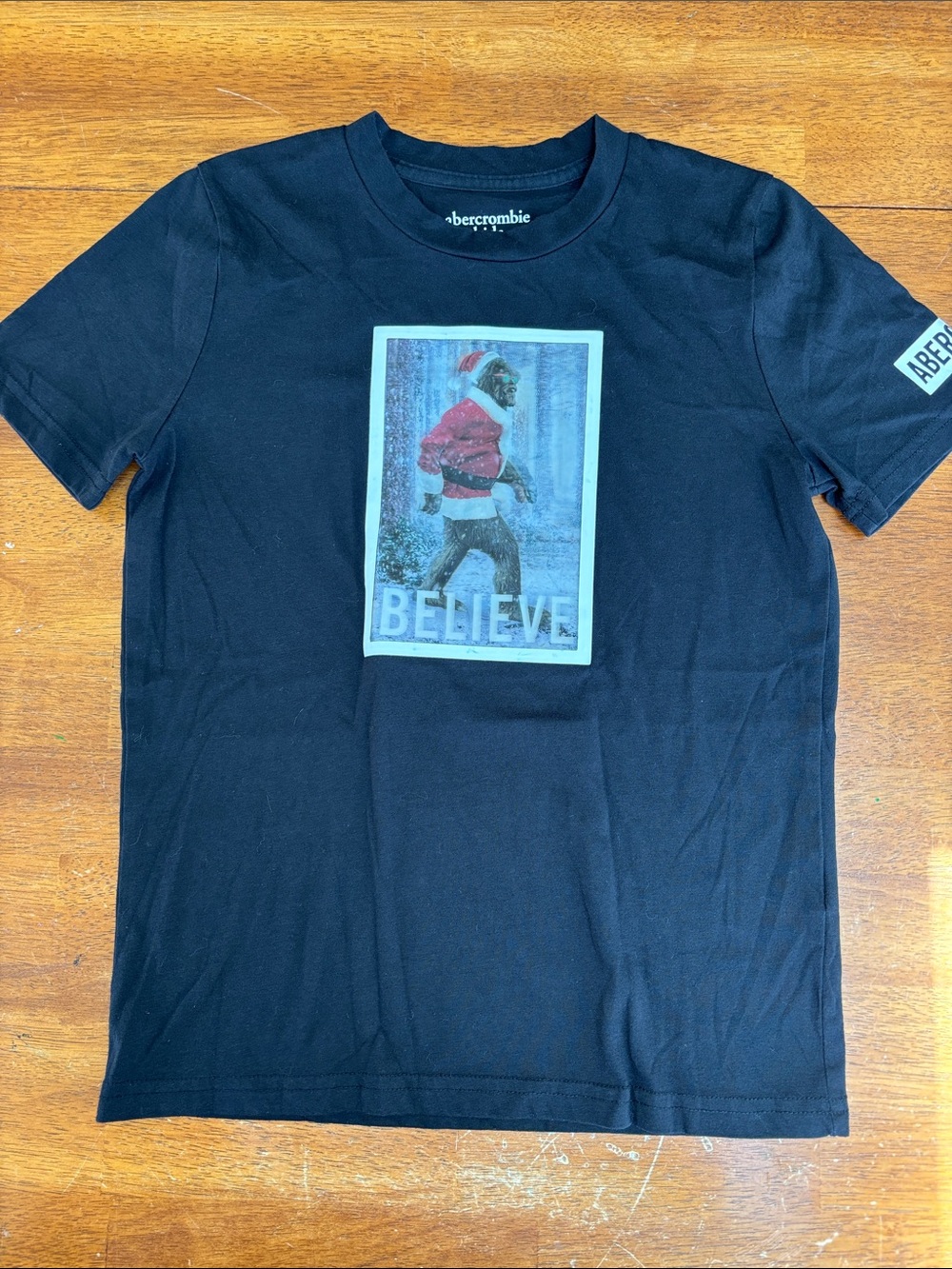 Abercrombie Black Graphic 'Believe' Short Sleeve Tee with Red Accent